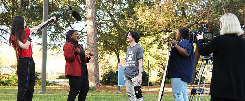 USA students filming an interview in communication class on campus.